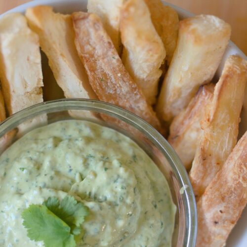 Air fryer yuca fries with cilantro lime sauce.