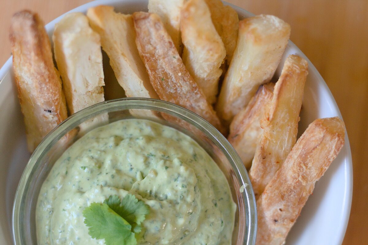 Air fryer yuca fries with cilantro lime sauce.